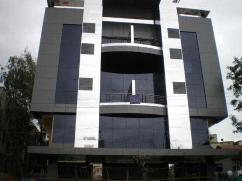 Hotel The Elite Suites Pune Bagian luar foto